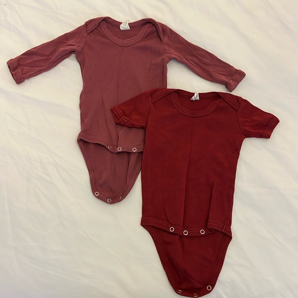Kate Quinn Pair of baby bodysuits